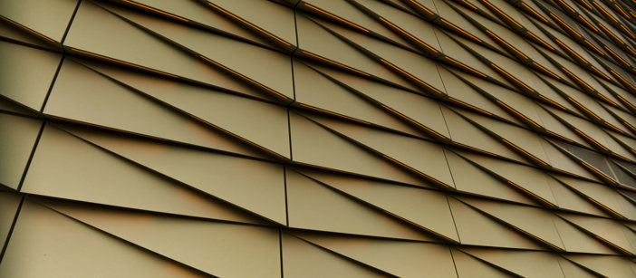 Golden tinted aluminium façade of the Casino Holland in Utrecht.