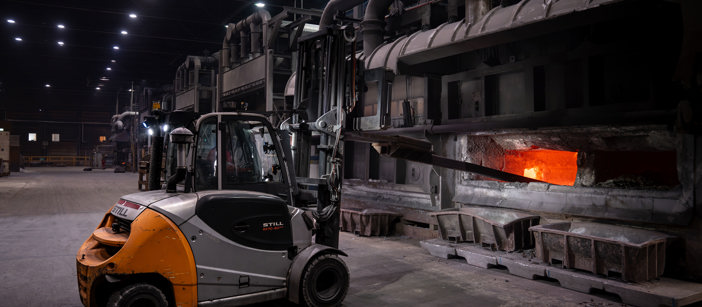 The ongoing scraping process during aluminium processing at Speira's aluminium plant.