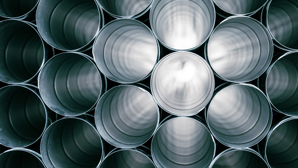 The inside of aluminium tubes that are being stacked. 