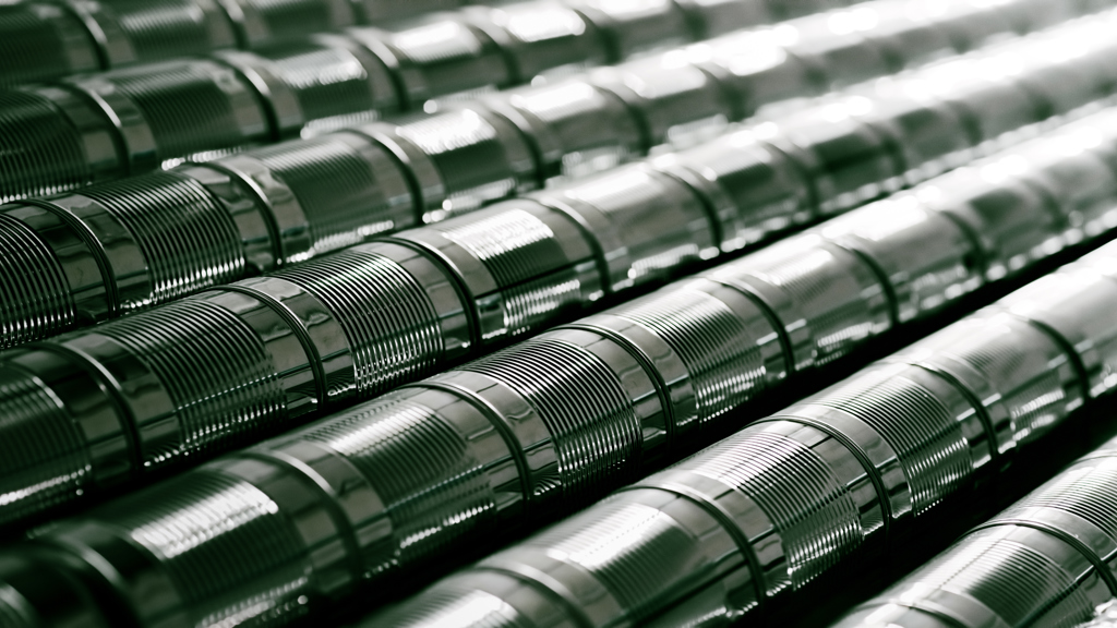 Aluminium cans for food storage, stacked and aligned.