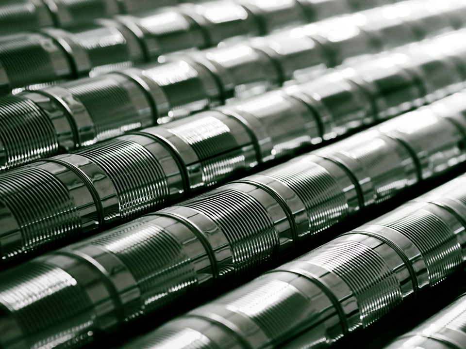 Aluminium cans for food storage, stacked and aligned.