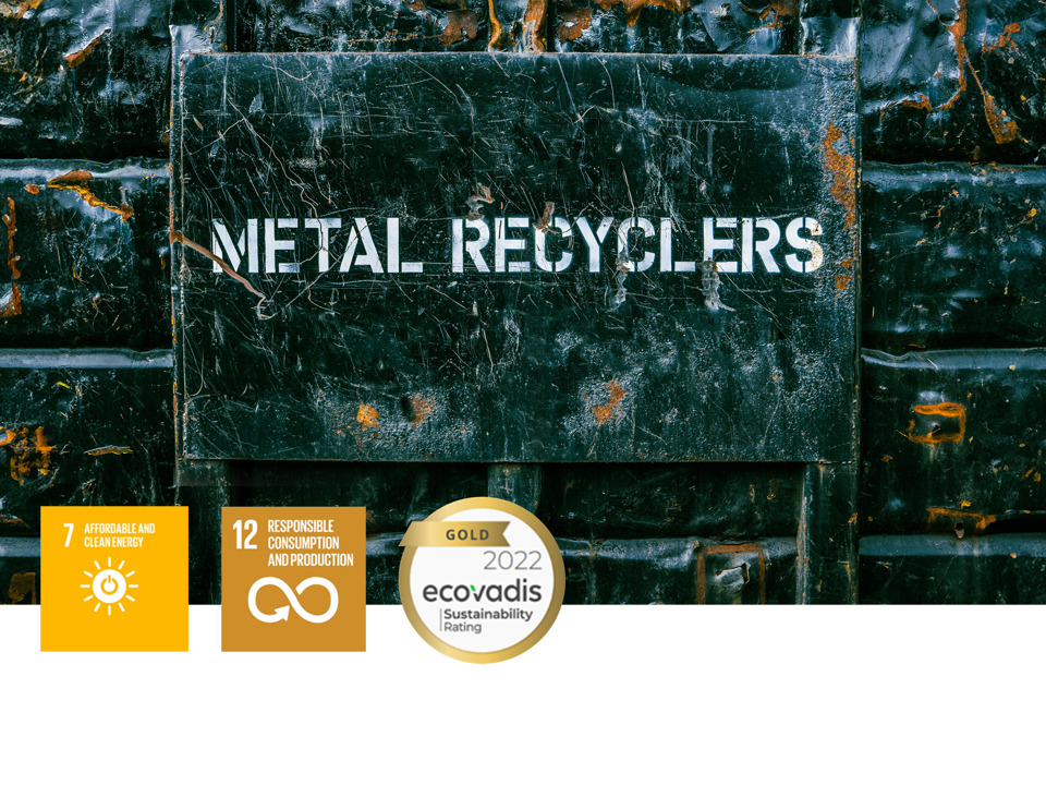 Green-tinted piece of metal with “metal recyclers” on it and the ecovadis Gold Rating.