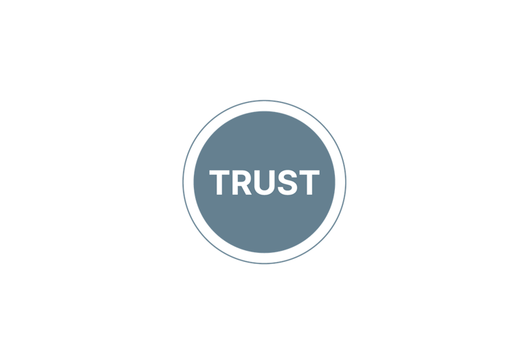 The word “trust” written in a greyish blue circle.