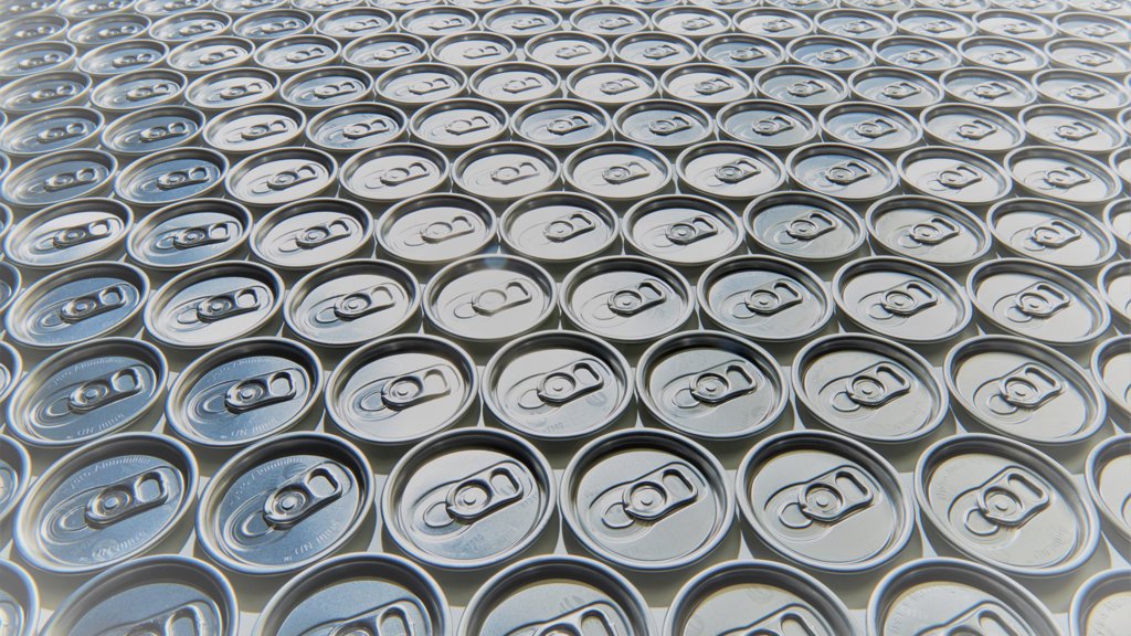 The top of aluminium cans, geometrically aligned next to each other.