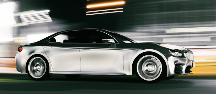 The aluminium shell of a driving car in motion.