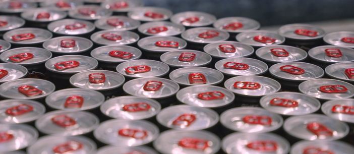 Beverage cans collected next to each other.