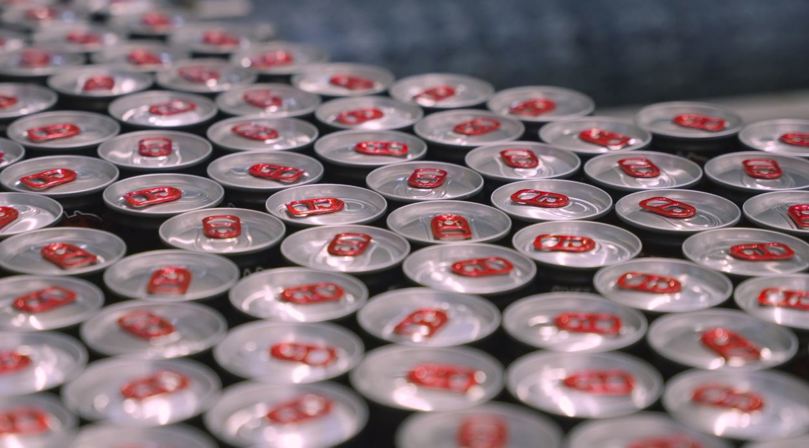 Beverage cans collected next to each other.