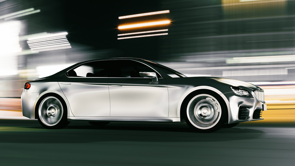 The aluminium hull of a driving car in motion.