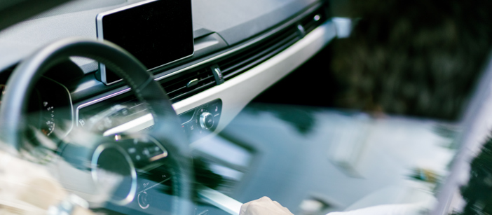 A car’s cockpit including multiple metal components.