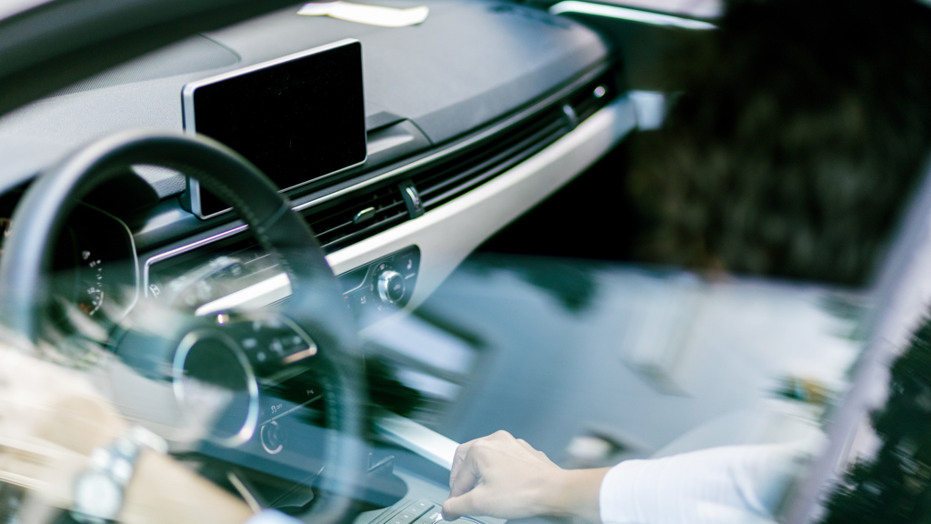 A car’s cockpit including multiple metal components.